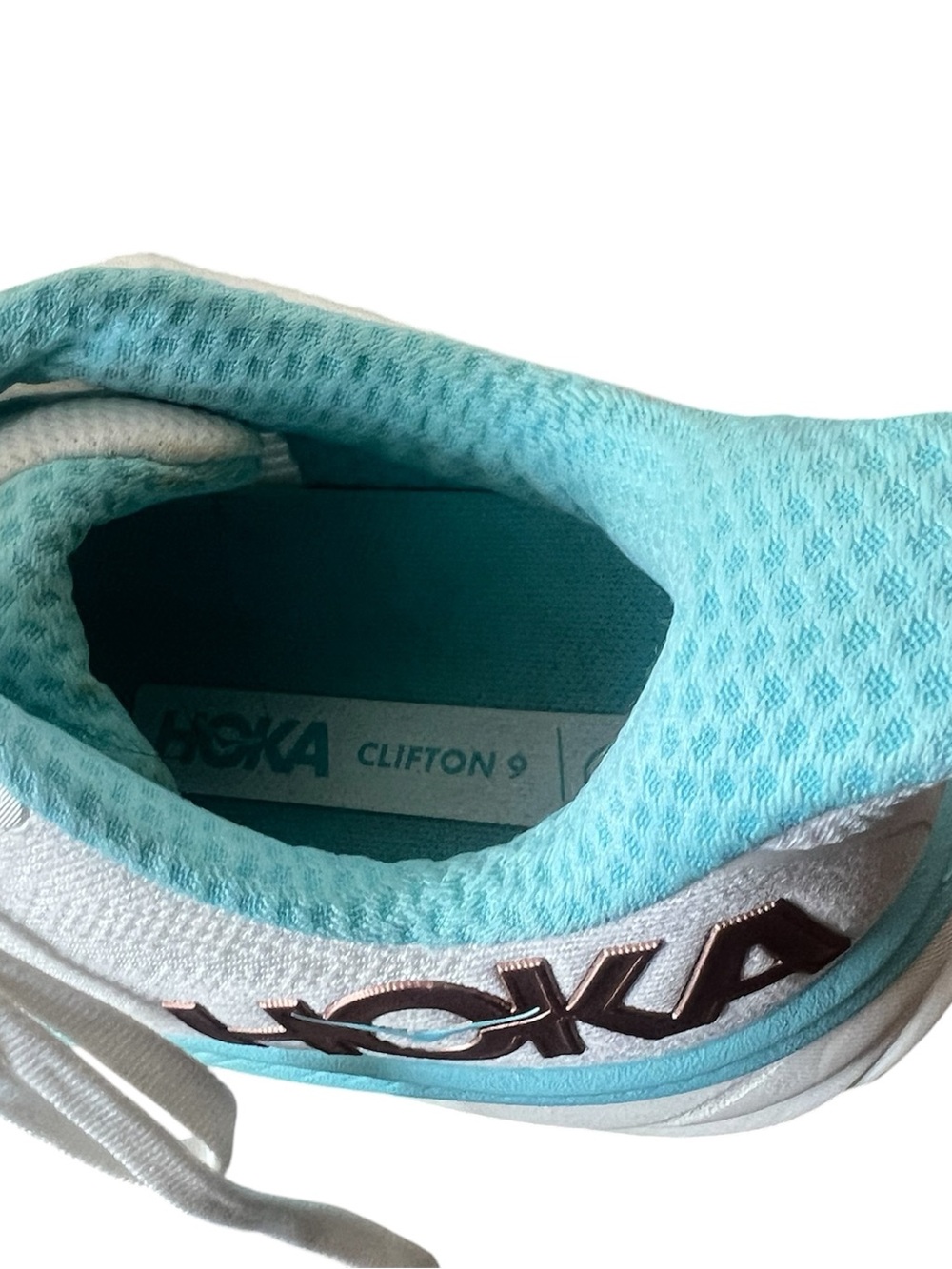 HOKA Women's Clifton 9 in the Frost / Rose Gold colorway, white mesh, sky blue. - Picture 8 of 8